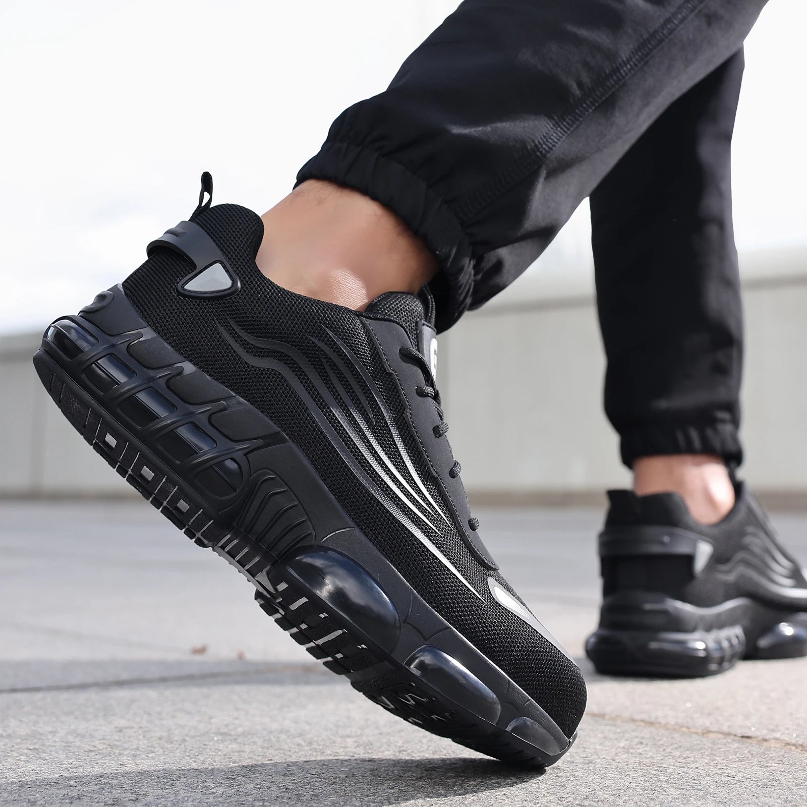 Ansoff men's work shoes with lightweight design, TPU sole, anti-shock and anti-stab features, suitable for all seasons.
