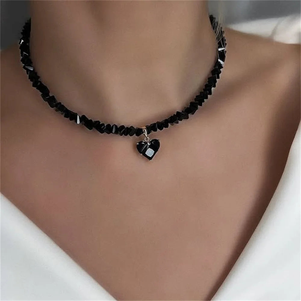 Vintage zircon heart pendant necklace for women with boho geometric design and transparent crystals, by Ansoff.