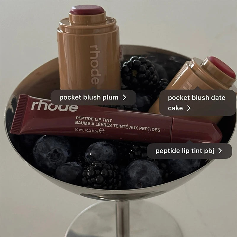 Ansoff Brand skin balm and waterproof lip gloss with jelly bean flavor, featuring a moistening lipstick and blusher stick in vibrant packaging