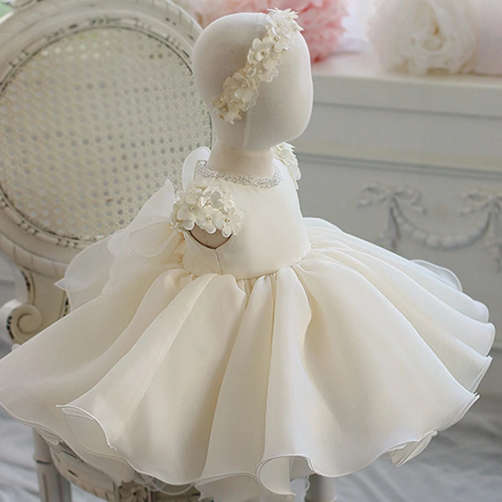 White 3D flower princess gown for girls by Ansoff, featuring classic O-neck design, tulle fabric, ideal for weddings and performances.