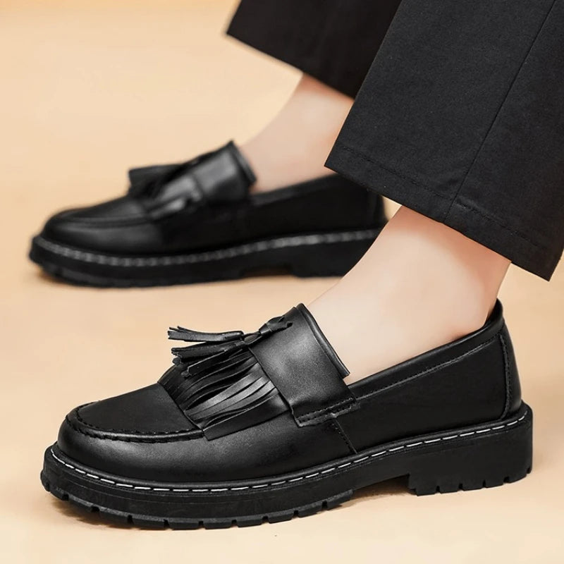 Men's leather slip-on shoes by Ansoff with round toe, shallow opening, and high-quality formal design for business and large sizes.
