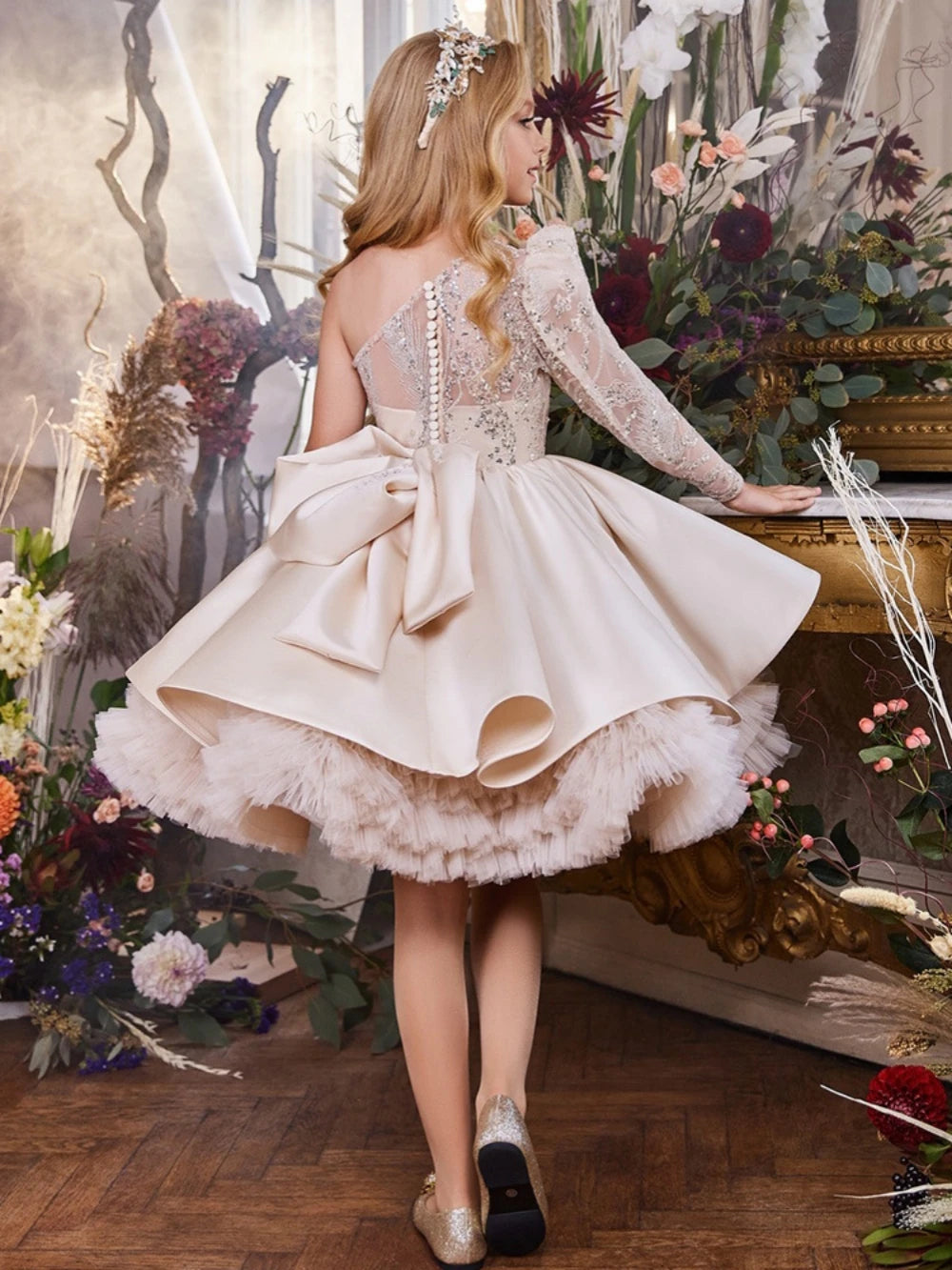 Girls' one-shoulder long sleeve dress by Ansoff with glitter and sequins, designed for stage performances, birthdays, and parties.