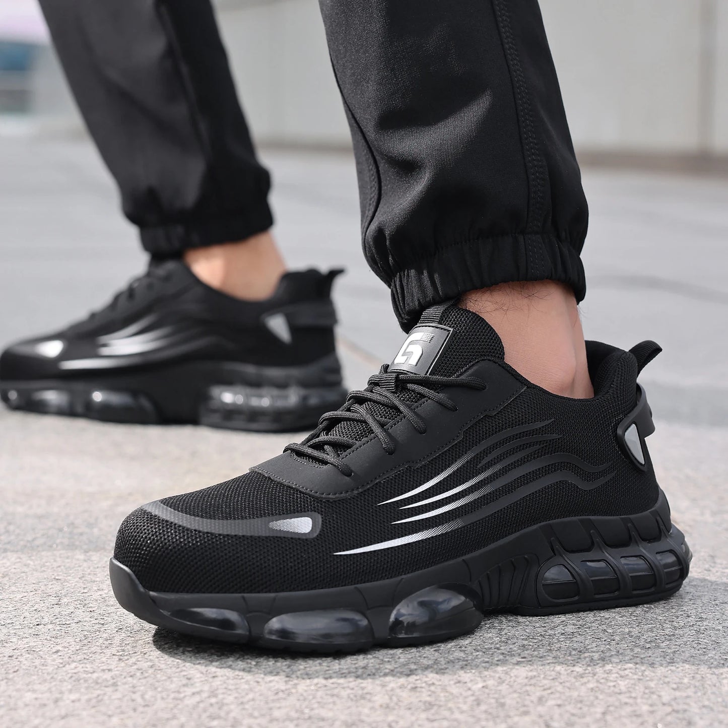 Ansoff men's work shoes with TPU sole, lightweight design, anti-shock and anti-stab features, suitable for all seasons.