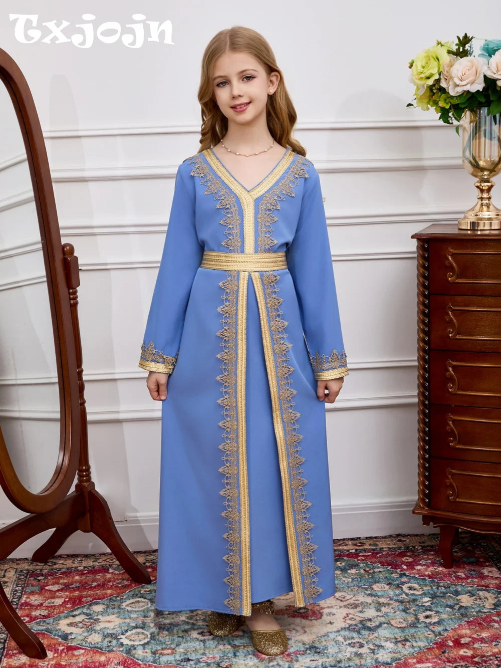 Girls blue Muslim dress by Ansoff featuring gold lace embroidery, long Moroccan kaftan style with belt and V-neck for Eid parties.