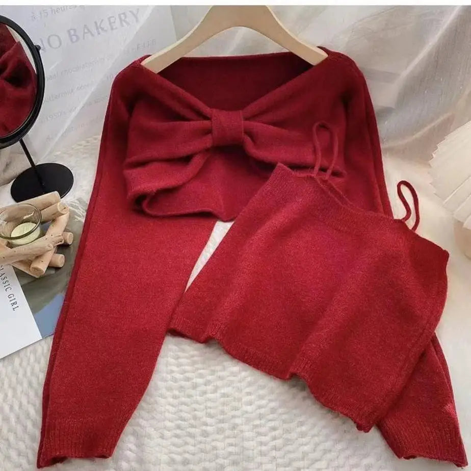 Ansoff women's two-piece sweater suit with suspenders and bow, featuring long sleeves and a short top for autumn 2025 fashion.