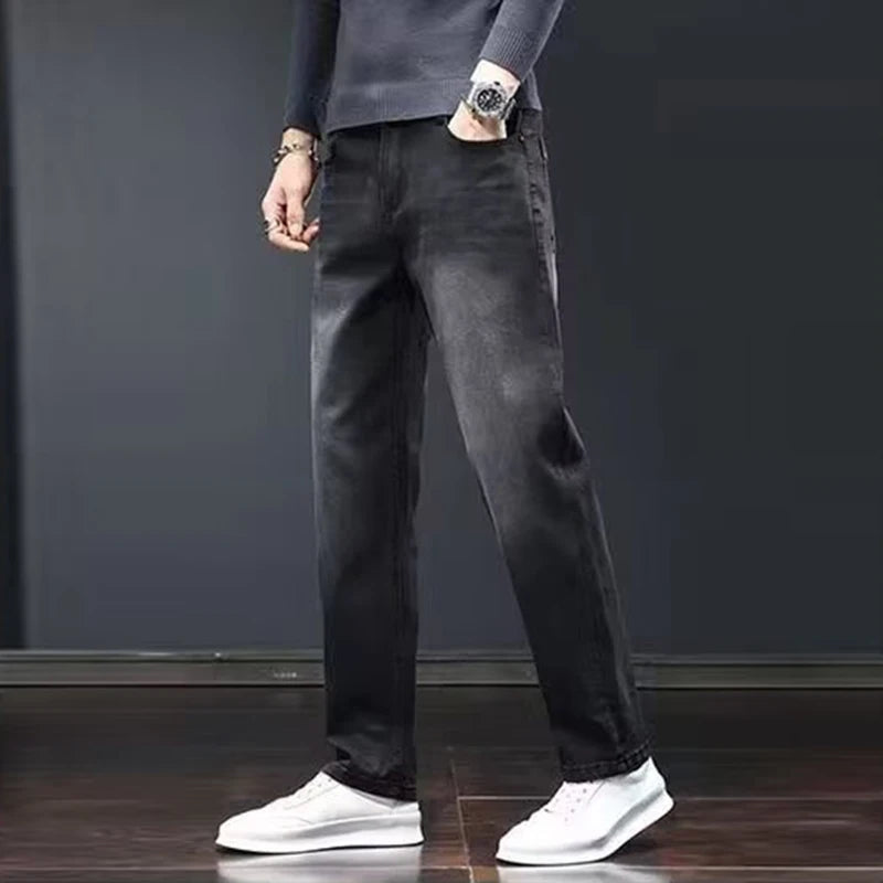 Men's dark gray elastic slim fit denim jeans by Ansoff, featuring a loose straight style and wear-resistant fabric.