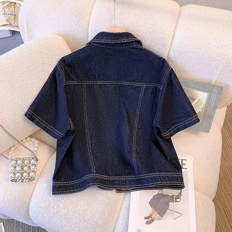 Women's denim jacket by Ansoff featuring short sleeves, vintage-inspired streetwear style, perfect for summer casual outfits.