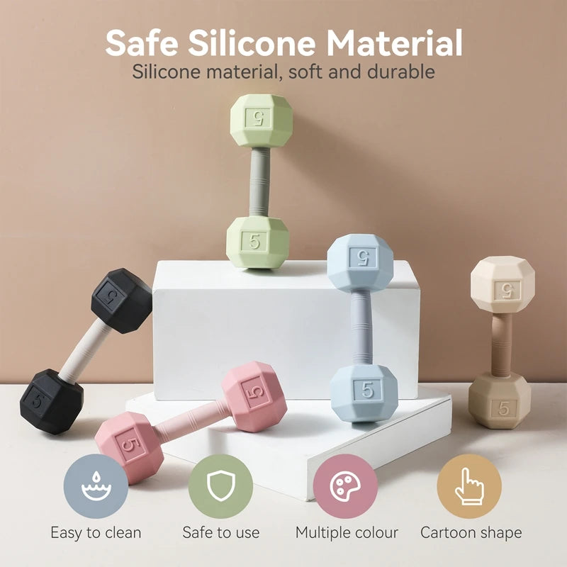 Ansoff baby silicone teething rattle toy shaped like a cartoon dumbbell with bell sound, designed for sensory and cognitive development.