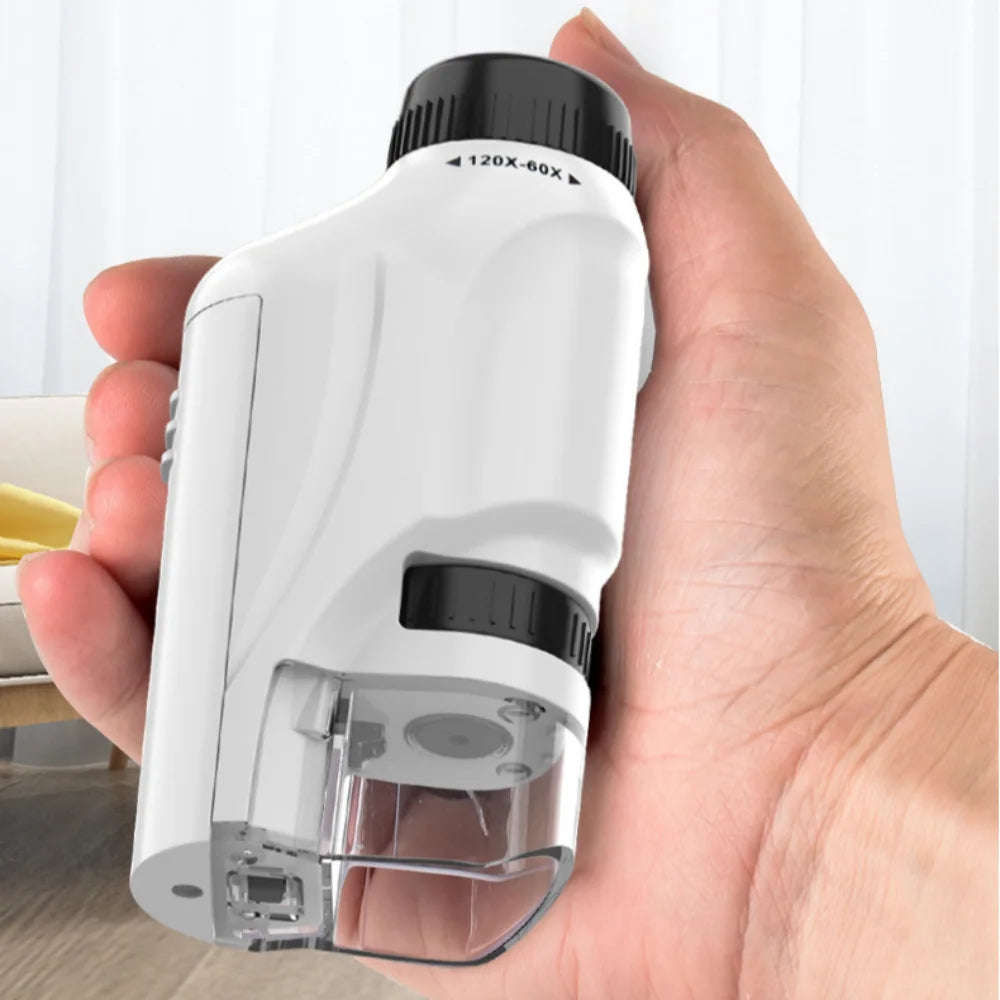 Ansoff handheld microscope with 60-120x zoom, LED light, battery-powered, suitable for kids' science exploration.