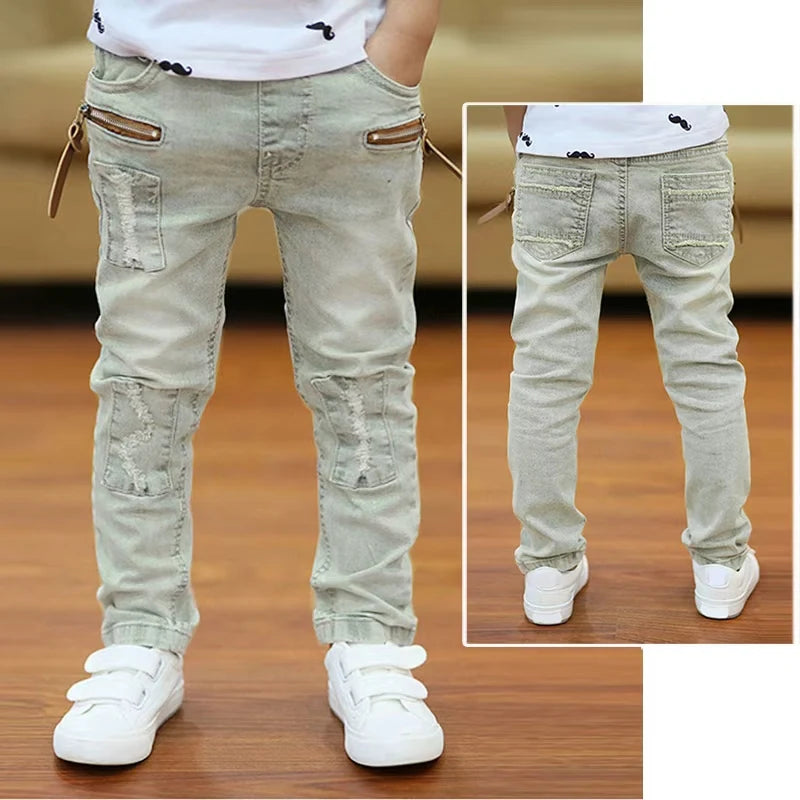 Kids' denim cowboy jeans by Ansoff, boys' sports trousers in size 4 to 12, featuring classic denim style and durable fabric.