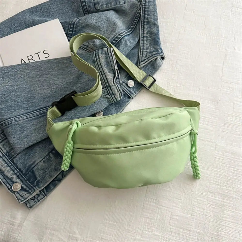Ansoff large capacity nylon crossbody handbag with belt pouch, casual solid color travel hip bag for students and couples.