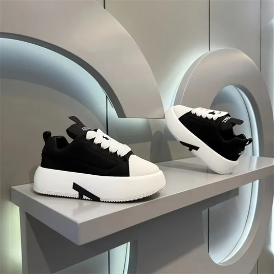 Ansoff men's slip-resistant casual shoes in a solid color, featuring comfortable design suitable for outdoor walks and jogging.