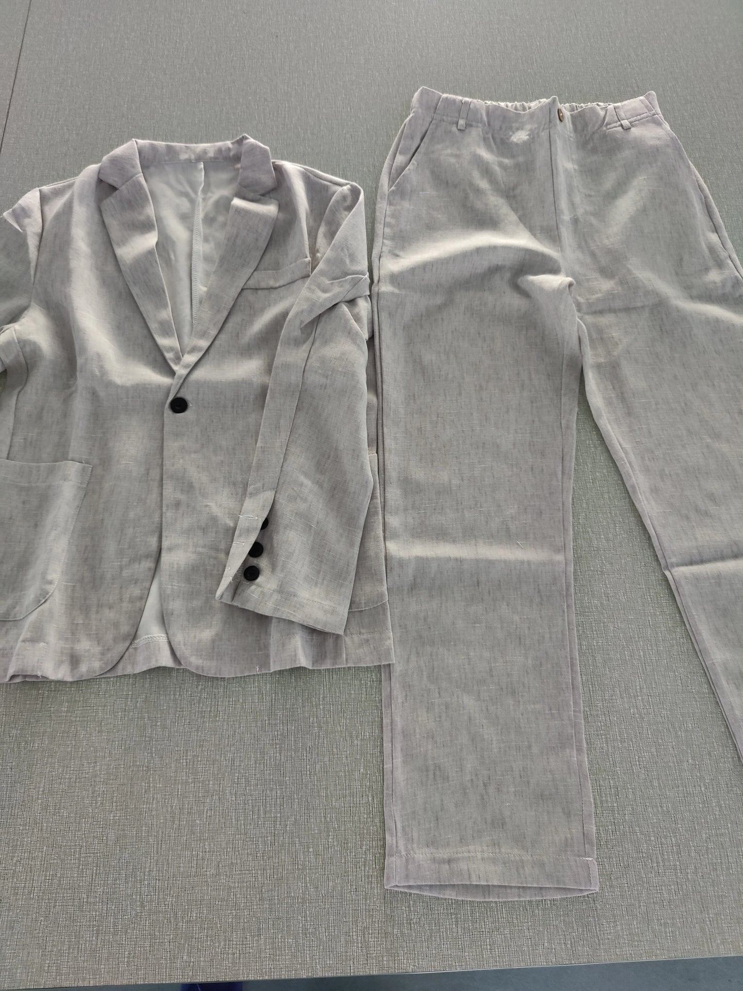 Men's summer office suit by Ansoff, includes airy slim fit blazer and comfortable dress pants, perfect for professional attire.