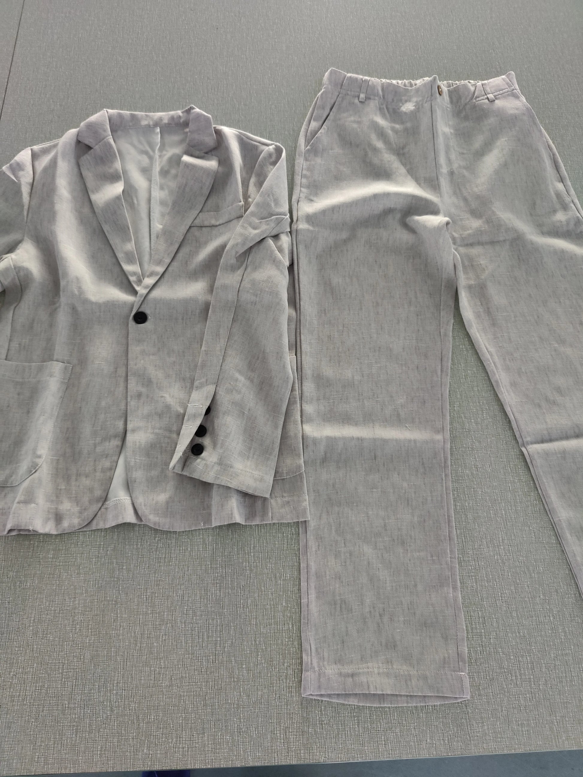 Men's summer office suit by Ansoff, includes airy slim fit blazer and comfortable dress pants, perfect for professional attire.