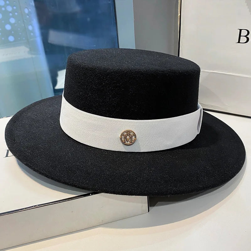 Elegant women's fedora hat by Ansoff featuring a ribbon band, suitable for weddings and fashion events, made of felt with a stylish brim