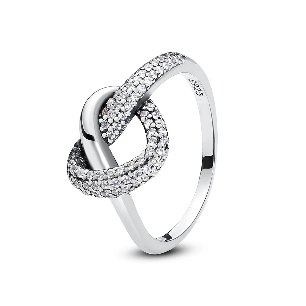 Sterling silver rings for women by Ansoff featuring a crown, love heart, wishbone, and rose gold crystal accents.