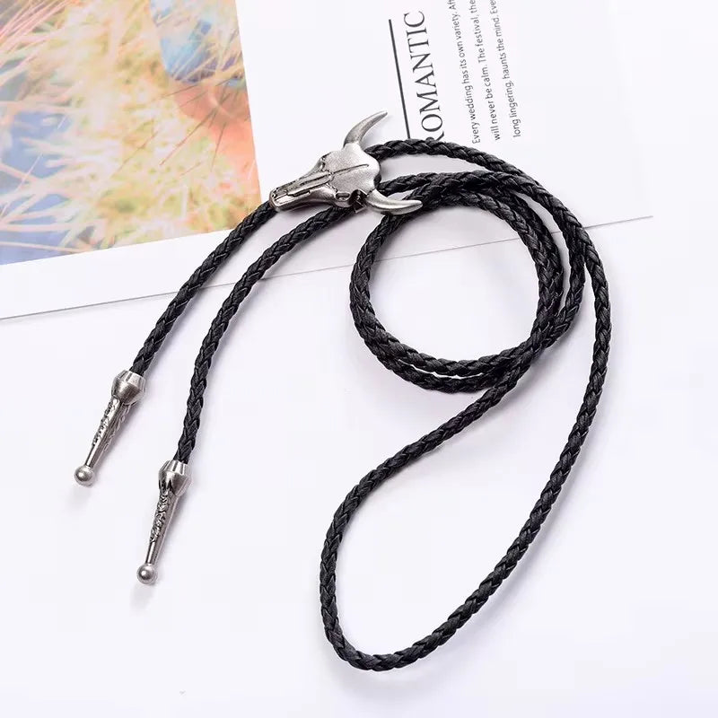 Adjustable cowboy bolo tie with a bull head pendant, five-star design, faux leather cord, suitable for rodeo and western dance outfits.