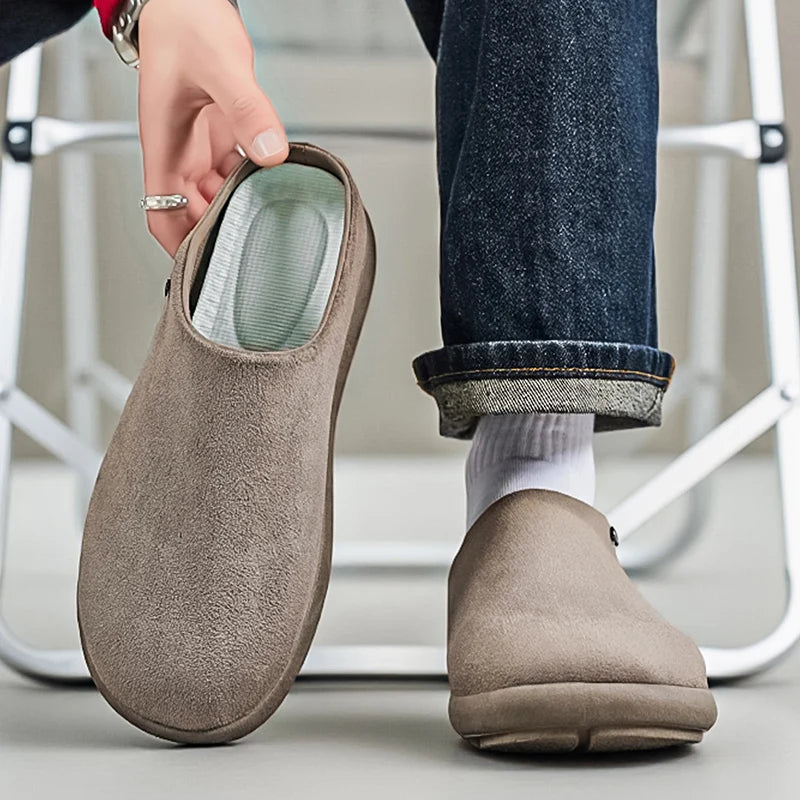 Men's suede leather slippers with cork footbed, arch support, and slip-on mule design by Ansoff, ideal for winter comfort.