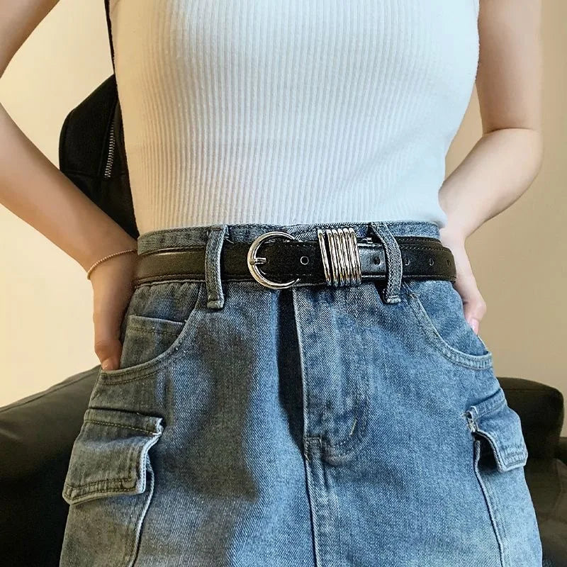 Black leather belt with needle metal buckle, two-layer cowhide design, suitable for women and men, casual and dress wear.