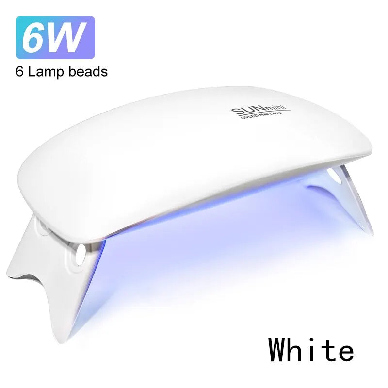 Ansoff 6W mini UV LED nail dryer machine with USB cable, compact portable nail lamp for drying polish and varnish at home.