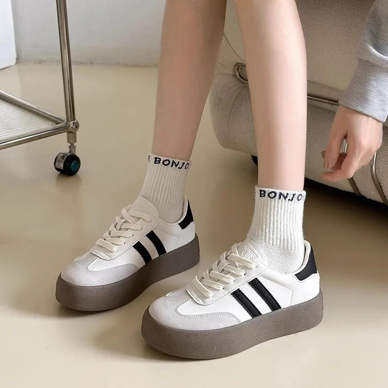 Ansoff women's casual sports shoes with thick soles, soft inner lining, cowhide material, and stylish design for 2024.