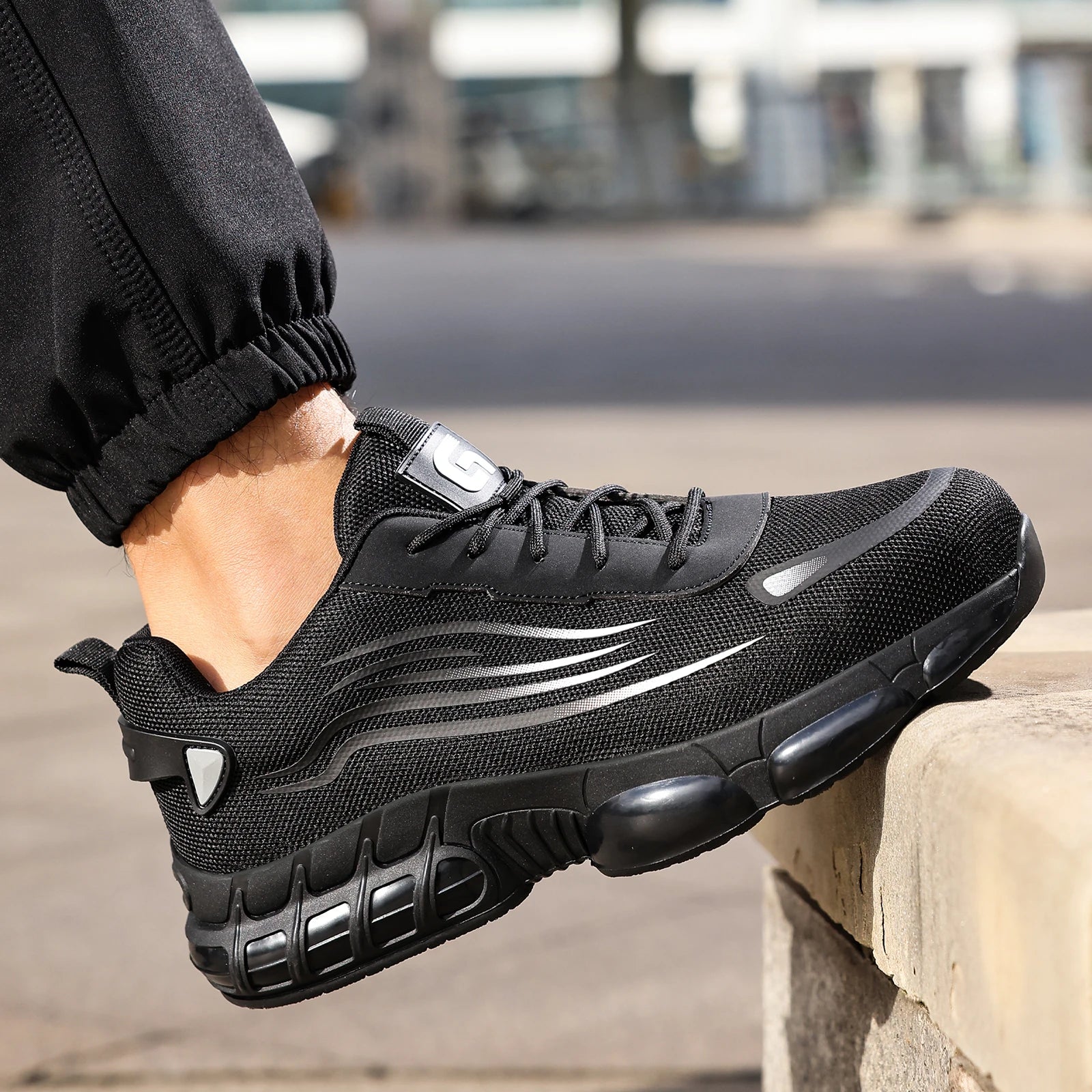 Men's Ansoff work shoes with anti-shock and anti-stab features, lightweight design, TPU sole, suitable for all seasons.