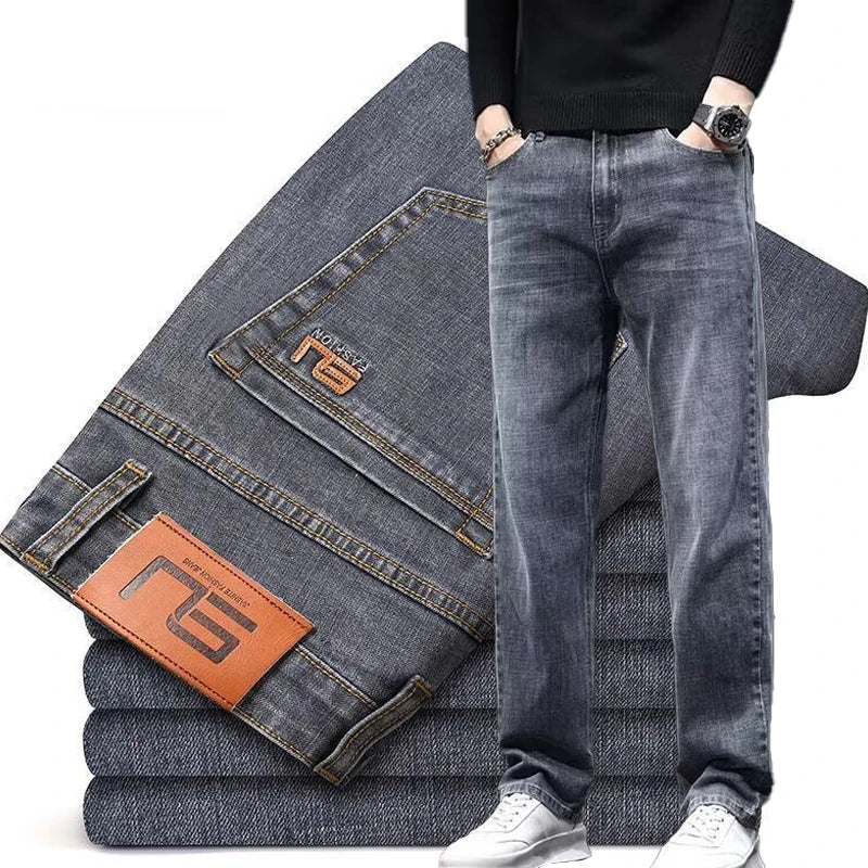 Men's dark gray slim fit denim jeans by Ansoff, with loose straight cut, elastic waist, wear-resistant fabric, casual style.