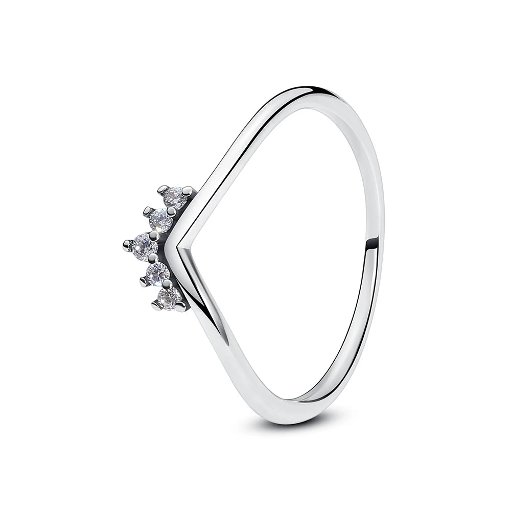 Sterling silver women's ring with crown, heart, and wishbone designs featuring rose gold accents and crystal details by Ansoff