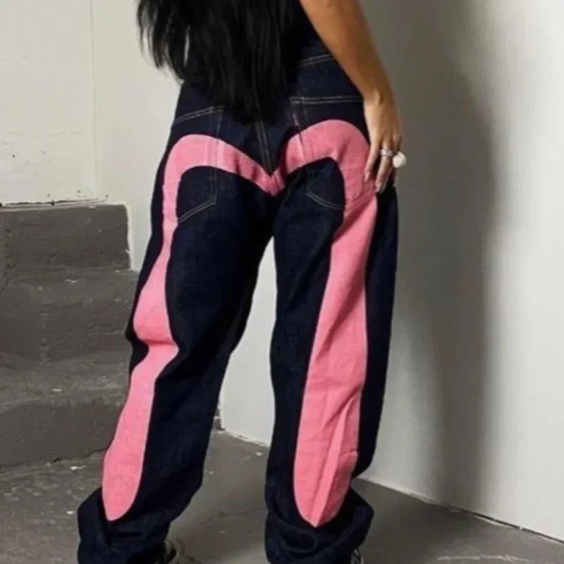 Black wide-leg denim jeans for women by Ansoff, featuring gothic Y2K retro streetwear style with cargo and punk print details.