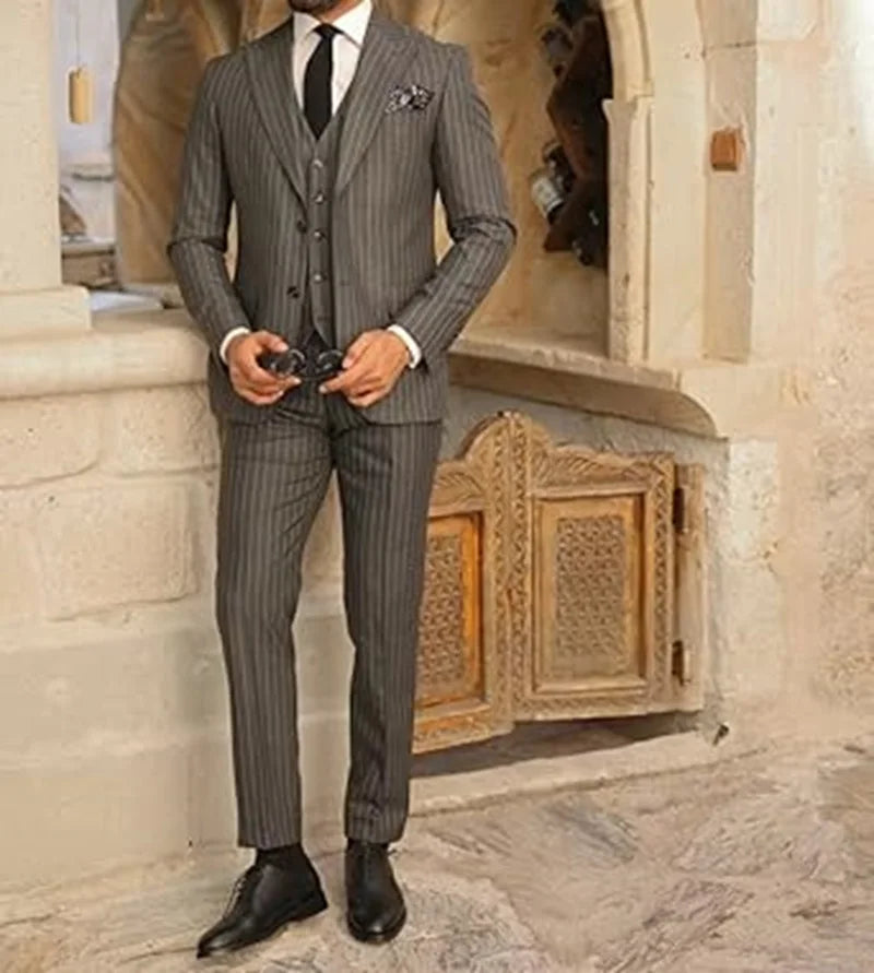 Men's elegant pinstripe suit by Ansoff, 3-piece blazer, vest, and pants set with peak lapel for wedding or business occasions.