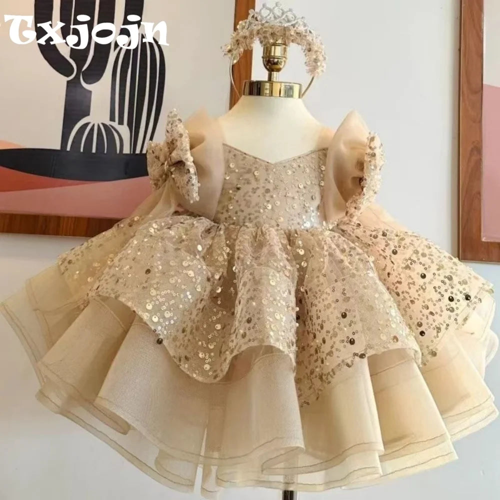 Girls' sequined princess dress by Ansoff with V-neck, bow shoulder, layered tulle skirt, perfect for formal parties and special occasions.