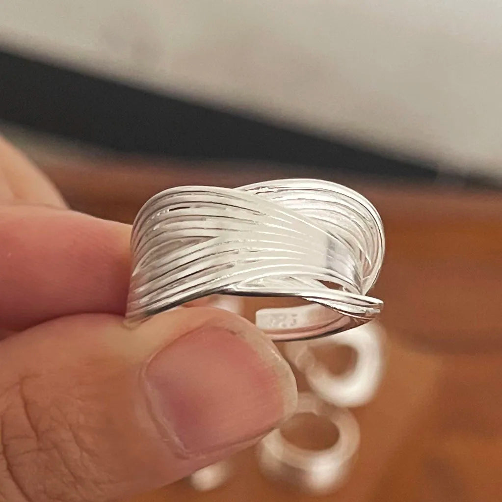Sterling silver rings for women, minimalist and handmade, featuring a wide moon design, perfect for pairing or gift-giving.