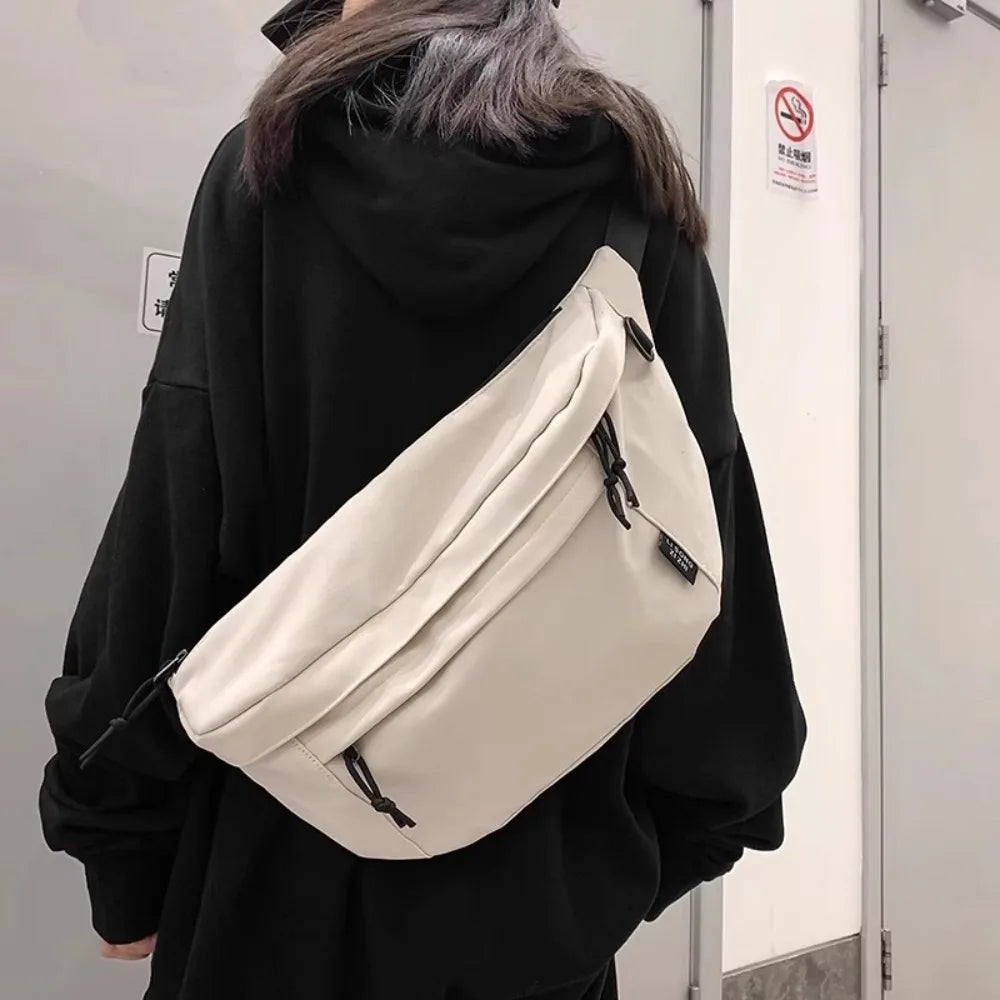 Ansoff large capacity nylon crossbody handbag with belt pouch, casual solid color chest bag for travel, students, and everyday use.