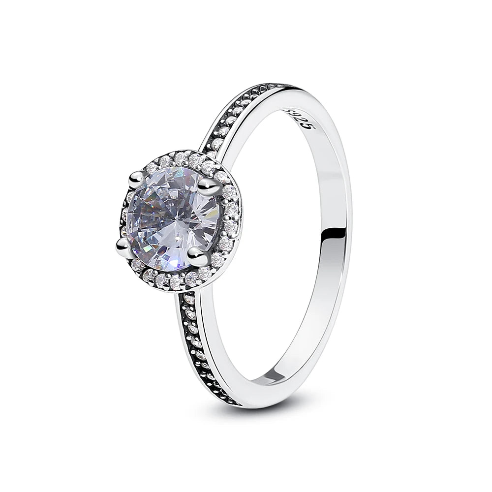 Sterling silver women's ring with crown, heart, and wishbone designs, featuring rose gold accents and crystal embellishments.