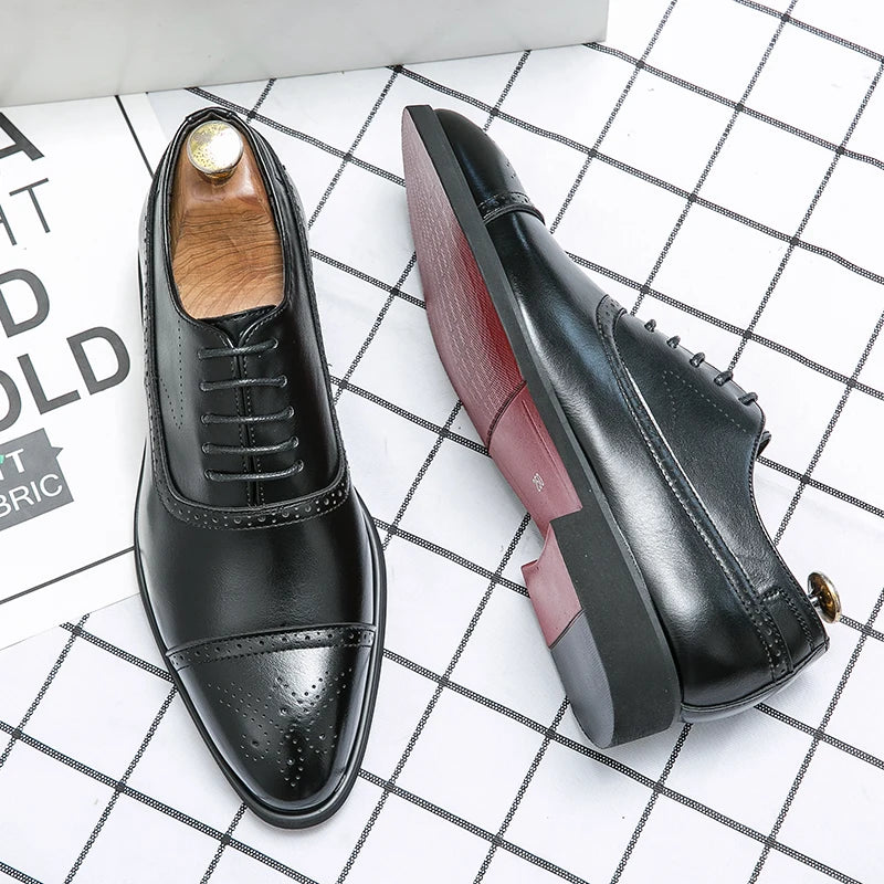 Red sole men's Oxfords by Ansoff with carved brogue detailing, lace-up design, suitable for business casual and formal occasions.