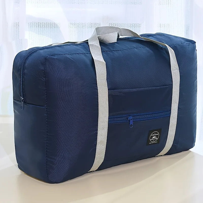 Ansoff foldable large capacity travel luggage bag with expandable design, suitable for sports, weekend trips, and check-in carry-on use.