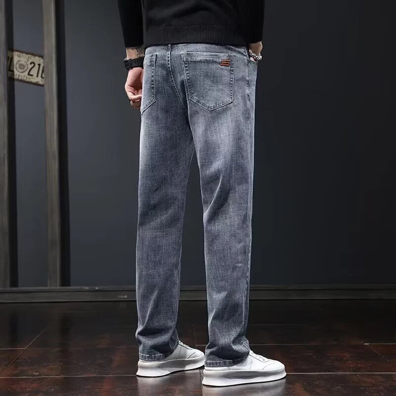 Men's dark gray slim fit denim jeans by Ansoff, featuring a straight, elastic waistband and wear-resistant, casual style.