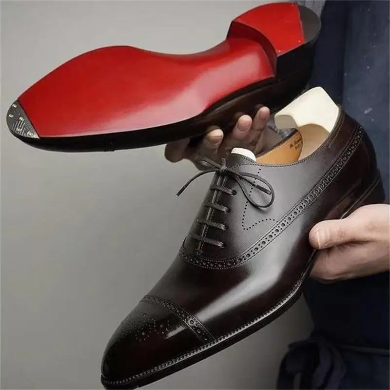 Red sole Ansoff men's Oxford shoes with carved brogue design, lace-up style, suitable for business, casual, and party wear.