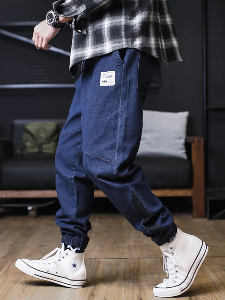 Plus size men's denim jogger jeans from Ansoff featuring loose fit, cargo style, ankle-length harem design, streetwear casual look