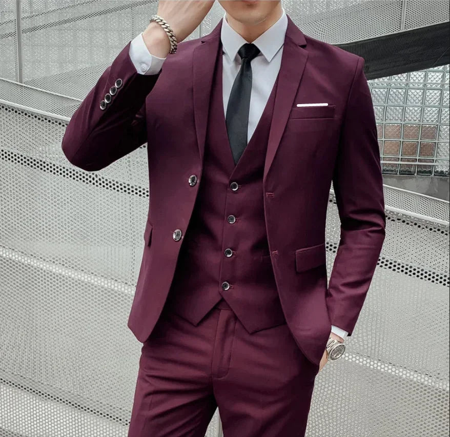 Men's stylish British-style suit with blazer, vest, and trousers, perfect for business, casual, or wedding occasions.