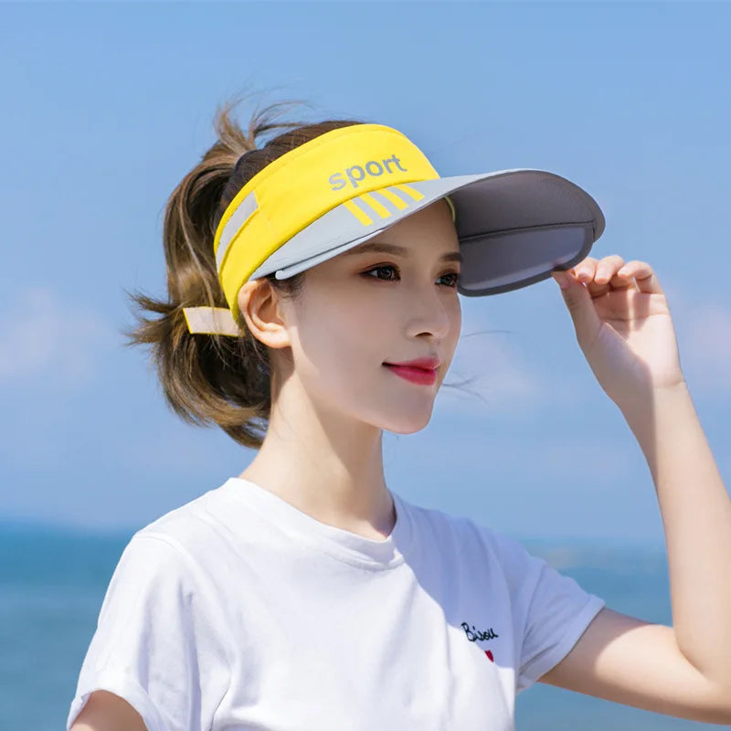Ansoff wide brim sun hat for women with a retractable visor and colorful print, ideal for summer outdoor beach and sport protection.