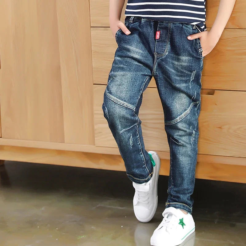 Ansoff boys' denim jeans with cowboy sports style, size 4-12, featuring classic blue denim and casual fit for kids.