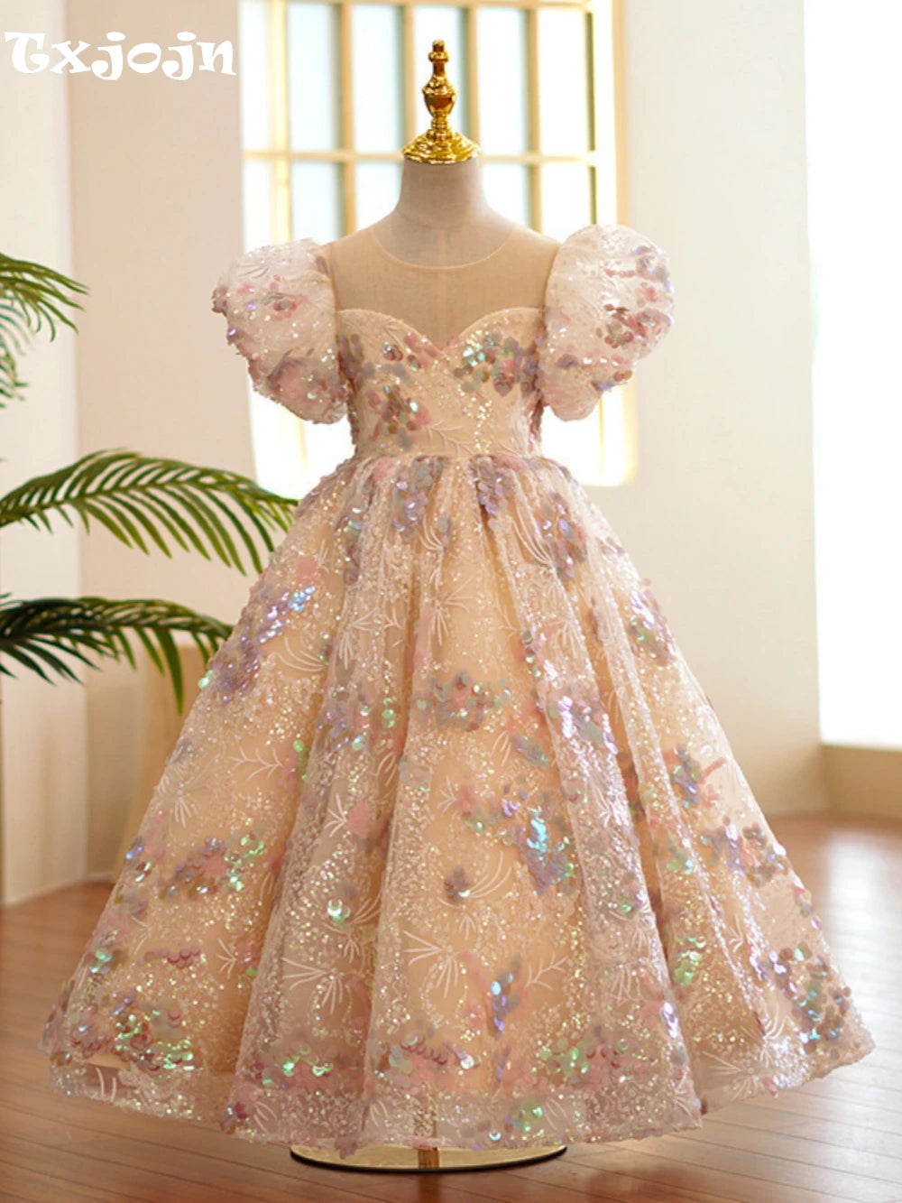 Sequined puff sleeve flower girl dress by Ansoff with O-neck, princess style, perfect for wedding, birthday, or piano performance.
