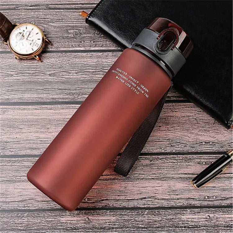 Ansoff BPA-free leak-proof sports water bottle in 400ml or 560ml, portable for hiking and outdoor activities.