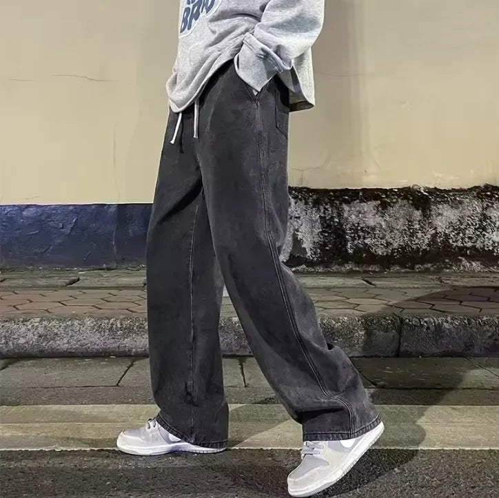 Men's loose streetwear jeans by Ansoff featuring straight wide-leg fit in black and light blue, Korean style fashion pants.