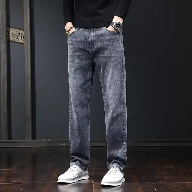 Men's dark gray elastic slim fit denim jeans by Ansoff featuring a straight leg, casual style, and wear-resistant fabric.