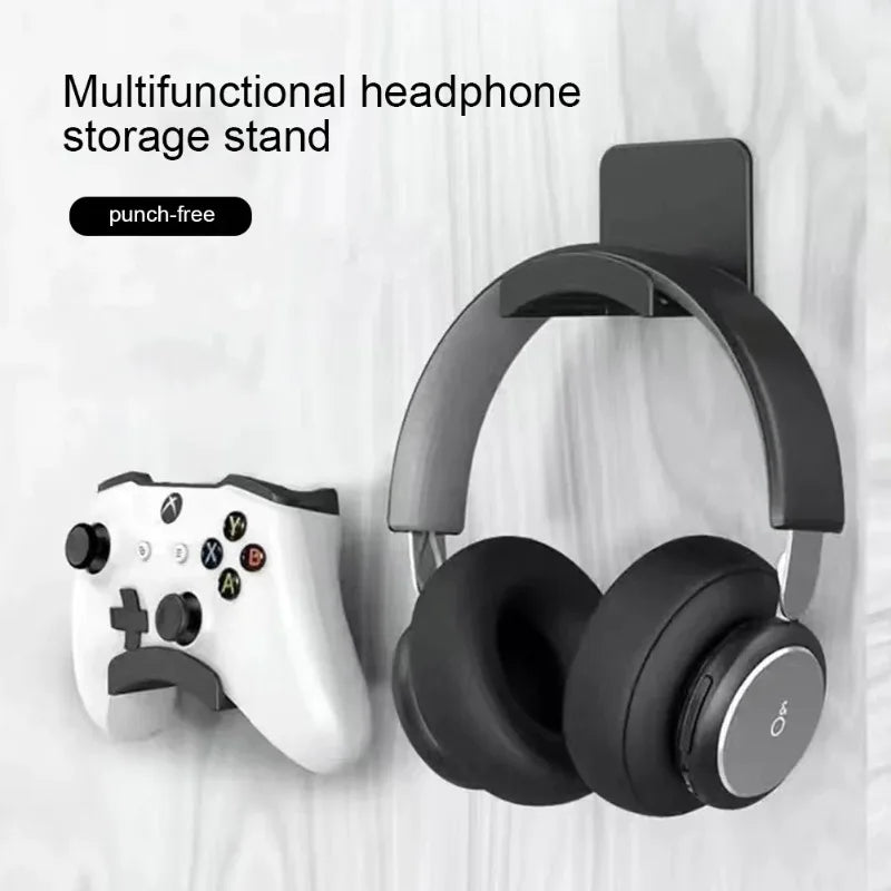 Ansoff universal headphone stand mounted on wall, adhesive plastic hanger holding gaming earphones and headset under desk.
