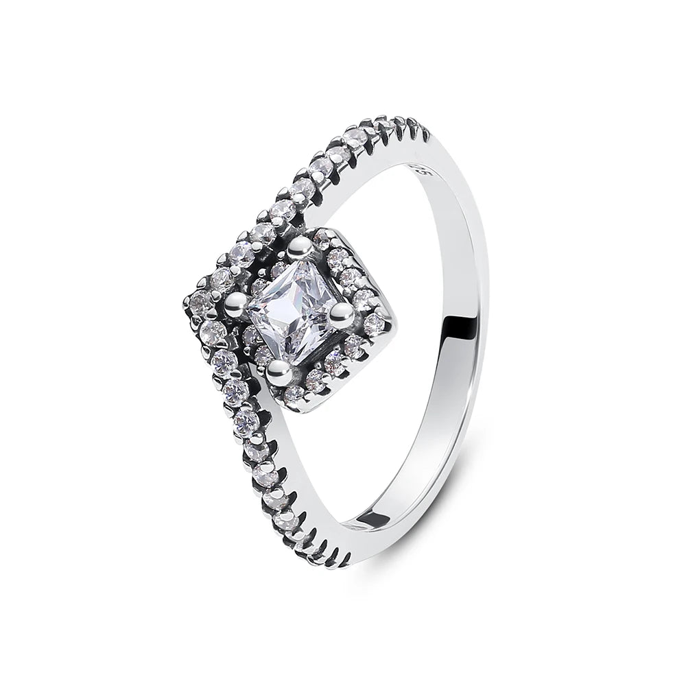 Sterling silver women's ring with crown, love heart, wishbone, and rose gold crystal accents, from Ansoff luxury jewelry collection.