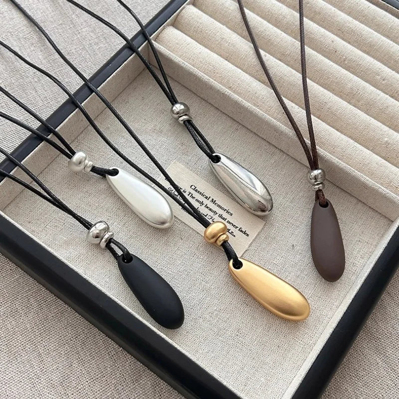 Minimalist Metal Water Drop Shaped Pendant Necklace for Women Simple Adjustable Long Black Rope Sweater Chain Fashion Jewerly