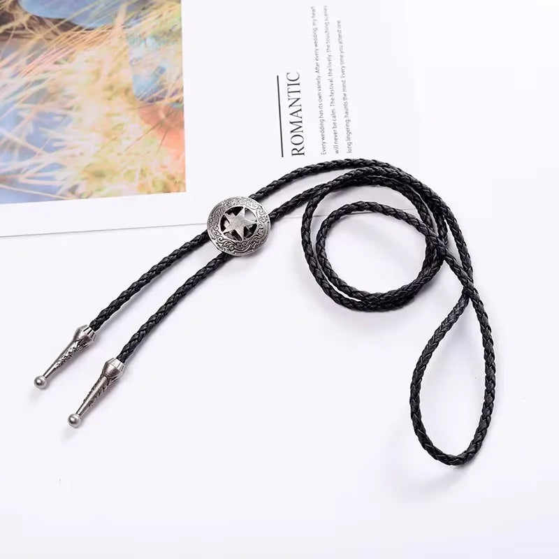 Adjustable cowboy bolo tie featuring a bull head pendant on faux leather, ideal for western rodeo dance attire.